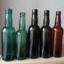 Lot of 5 vintage Guinness bottles Image 4