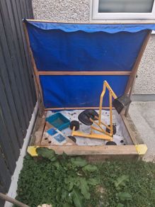 kids sandpit and digger