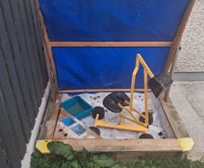 kids sandpit and digger