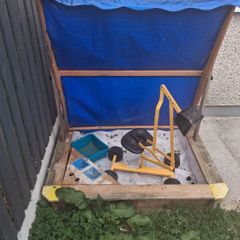 kids sandpit and digger