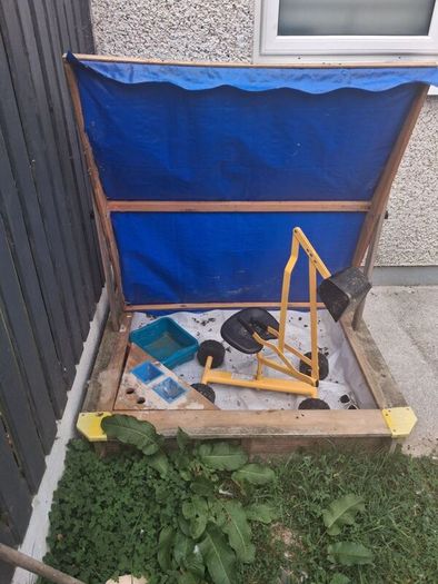 kids sandpit and digger