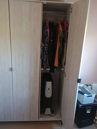 Three-door wardrobe in light wood effect finish