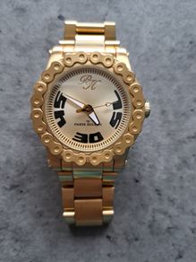 Paris Hilton Gold Watch unisex with new battery
