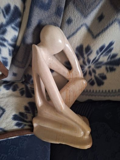 Based on the famous sculpture by Auguste Rodin, vintage soapstone figure, "The Thinker"