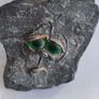 Face rock with green eyes hand carved Image 5