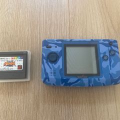 Neo Geo Pocket Color with game SNK vs. Capcom: Match of the Millennium