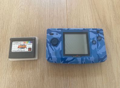 Neo Geo Pocket Color with game SNK vs. Capcom: Match of the Millennium