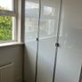 White cabinet with doors Image 4