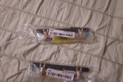 2 black and gold handles