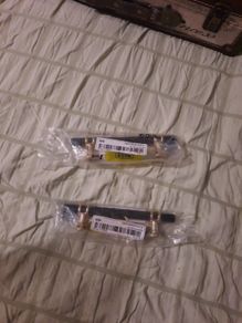 2 black and gold handles