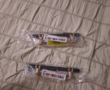 2 black and gold handles