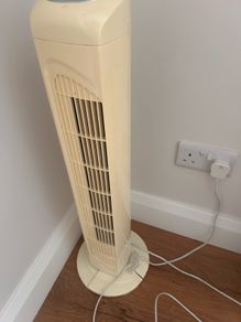 Fan Tower fan with oscillating & timer feature.
