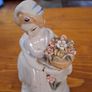 Vintage porcelain woman figurine detailed flowers Image 7