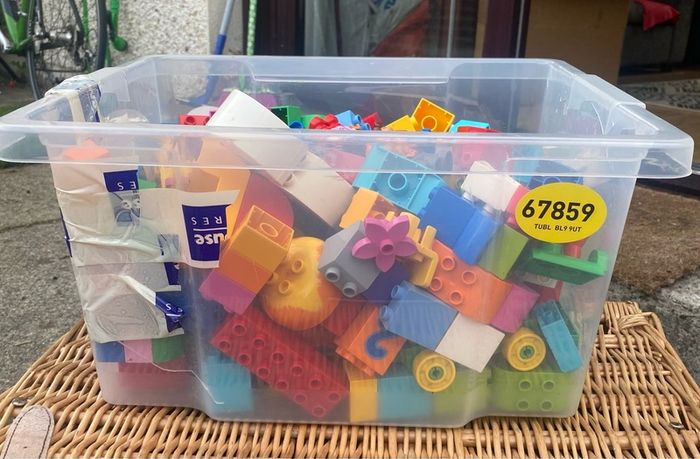 Box of Lego. 4 Figures and 4 Small Base Plates