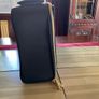 Estee Lauder Vanity case in black with applique style design in the front and a nice bow style handle on top Image 7