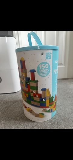 Bucket of wooden building blocks