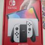 Nintendo Switch OLED (In the box) + Case + Super Mario Odyssey + Bomberman Image 3