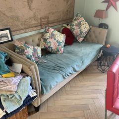 Comfy sofa useable with throw as seat covers need replacing but very solid