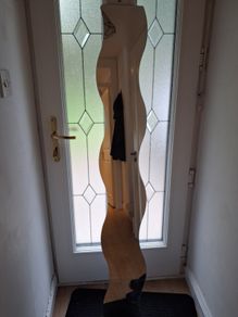 Long curved mirror