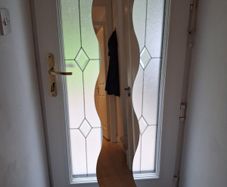 Long curved mirror