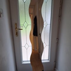 Long curved mirror