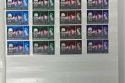 Collection. Brown stock book with collection of stamps celebrating Winston Churchill. Most are mint never hinged (MNH)