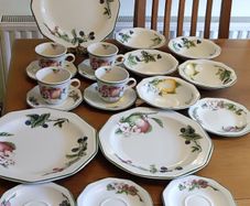 Set 20 pcs  by Churchill England, featuring a charming fruit and blossom design with a classic green rim. Beautifully made English pottery with lovely detail and quality.
