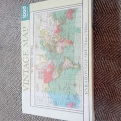 new and unopened 1000 piece puzzle map