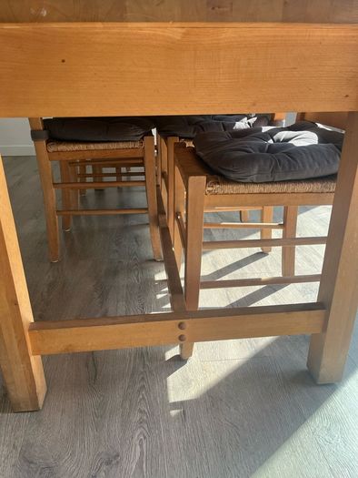Solid oak dining table and 8 chairs with storage drawers