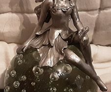 collectable paper weight with fairy on top