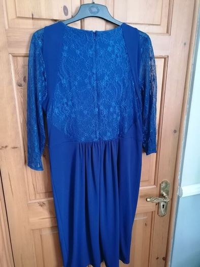 dress coast size 16 lined lace. Nice stretch  material Has small hoops for a belt lovely dress