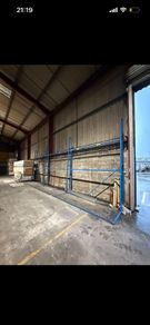 Vertical stand up sheet material storage racking