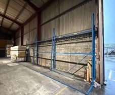 Vertical stand up sheet material storage racking