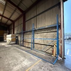 Vertical stand up sheet material storage racking