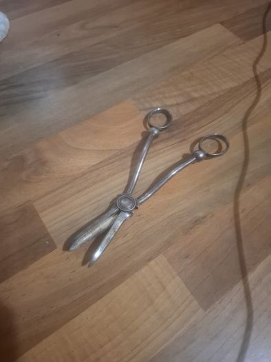 Antique candle snuffer