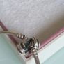 Pandora Moments encircled clasp bangle openwork swirl clasp holding a sparkling center crystal in great condition Image 8