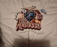cake topper with Rebecca on it
