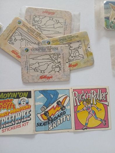 Scrace lot of 1980s retro cereal freebies . Kelloggs Rice crispies , sugar puffs stickers games and cards .