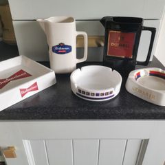 A selection of old ashtrays / jugs
