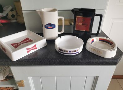 A selection of old ashtrays / jugs
