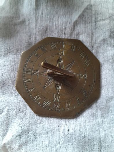 old miniature sundial