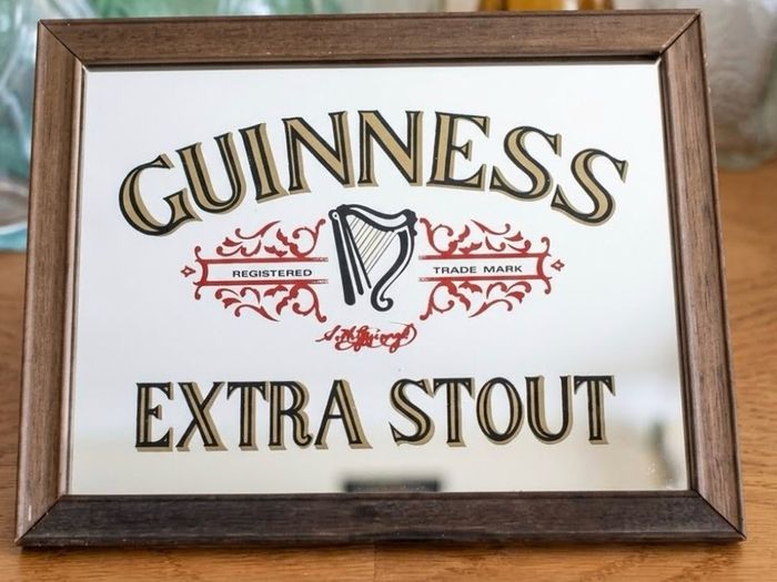 Vintage Guinness advertising mirror