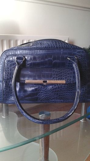 Brand new purple "clark" handbag