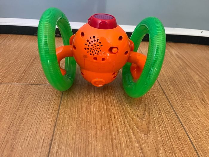 Bright Starts Roll & Glow Monkey Crawling Baby Toy