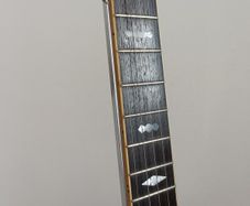 Sliding banjo fifth string capo