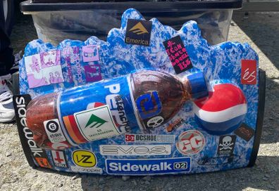 Pepsi sign with skateboarding stickers