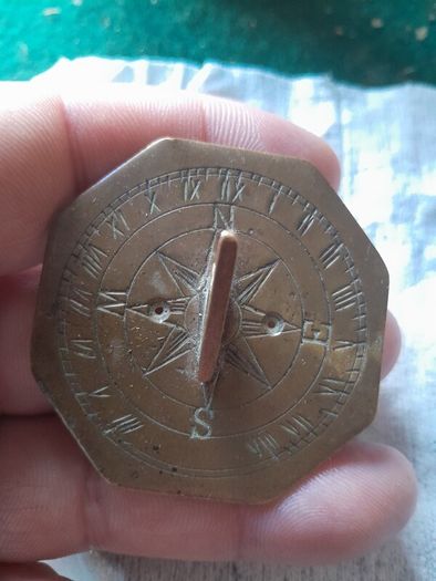 old miniature sundial