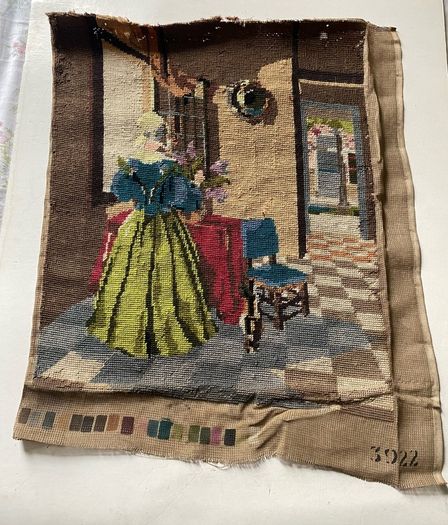 Vintage Penelope / Needlepoint Tapestry Design No. 3922) depicting a interior genre scene of a woman in a blue bodice and yellow skirt arranging flowers by a table.