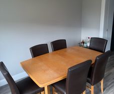 Oak extendable dining table + chairs