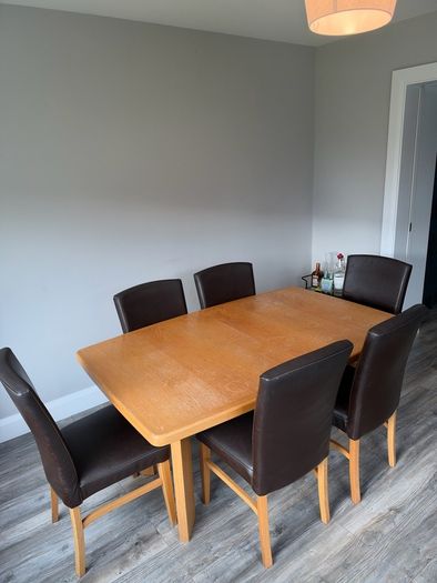 Oak extendable dining table + chairs